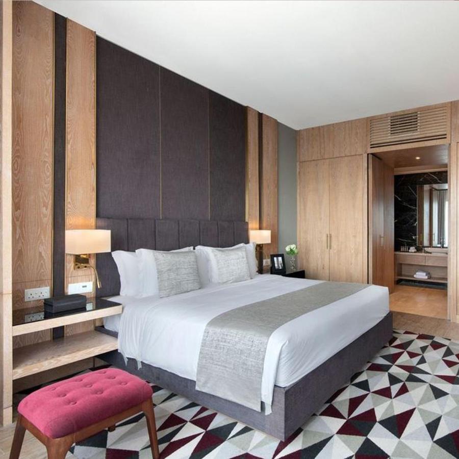 The Bentley Luxury Hotel & Suites Доха Екстериор снимка A bedroom at the hotel