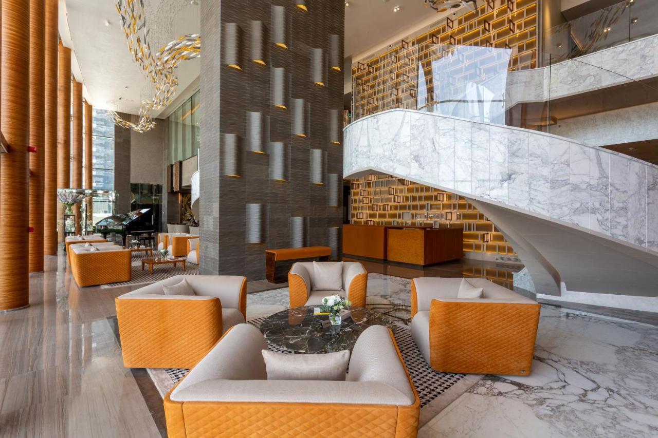 The Bentley Luxury Hotel & Suites Доха Екстериор снимка The lobby of the hotel