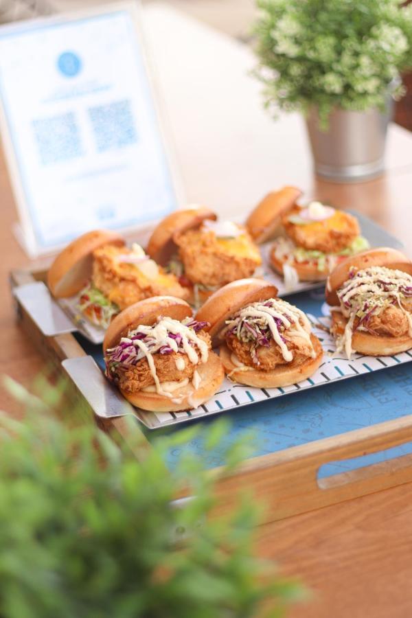The Bentley Luxury Hotel & Suites Доха Екстериор снимка A selection of sliders
